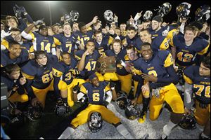 Whitmer players celebrate a Division I regional championship in Sandusky after defeating Wadsworth. The No. 2-ranked Panthers (13-1) fell in the state semifinals to Cleveland St. Ignatius.