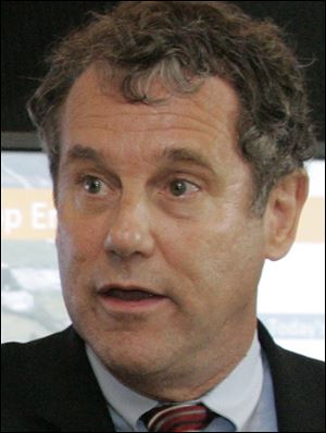 Sen. Sherrod Brown speculates that funds for the ads come form the oil industry, the Chinese, and Wall Street.