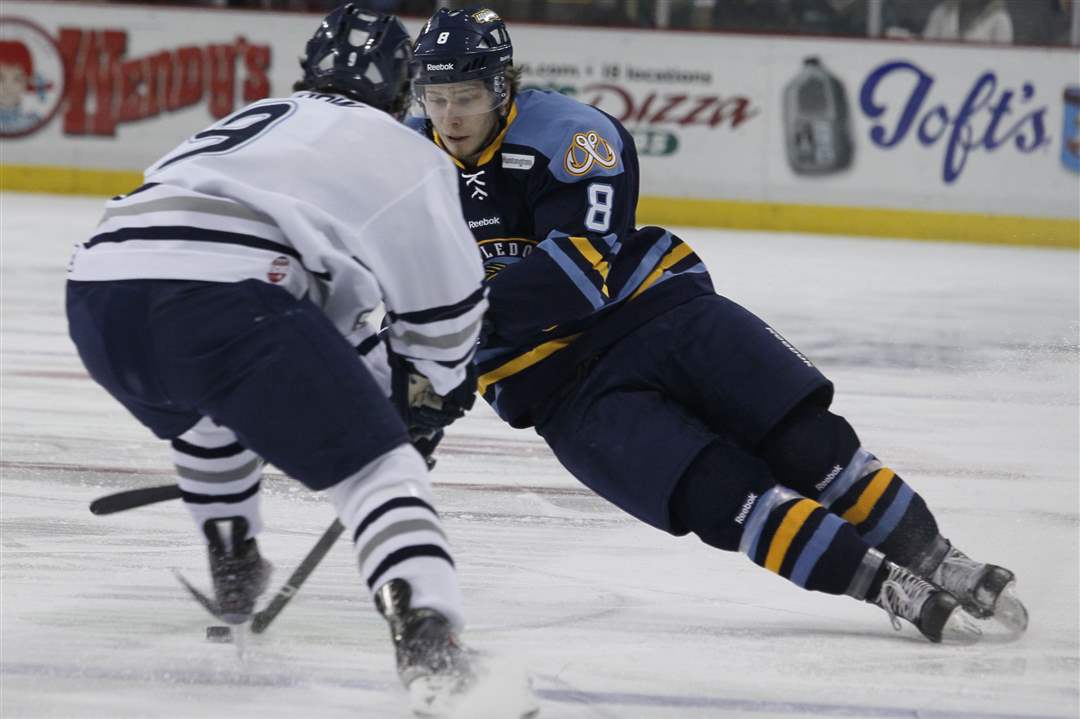 Toledo-Walleye-s-Gleason-Fournier-brings-the-puck-up-the-ice