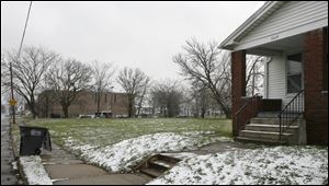 A vacant lot sits between 1001 Indiana Ave. and 1049 Indiana. An address of '1009 Indiana,' where a city official speculates work might have been done, doesn't exist. 