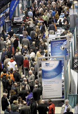 Hundreds gather on the floor of The Covelli Center for The Youngstown Ohio Utica & Natural Gas Conference & Expo in Youngstown, Ohio.
