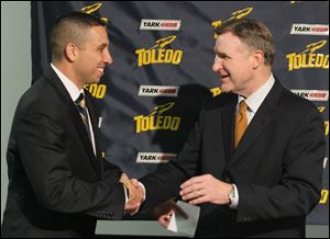 Matt Campbell, left, is named head football coach of the University of Toledo Rockets by athletic director Mike O'Brien.