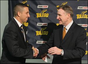 Matt Campbell, left, is named head football coach of the University of Toledo Rockets by athletic director Mike O'Brien.