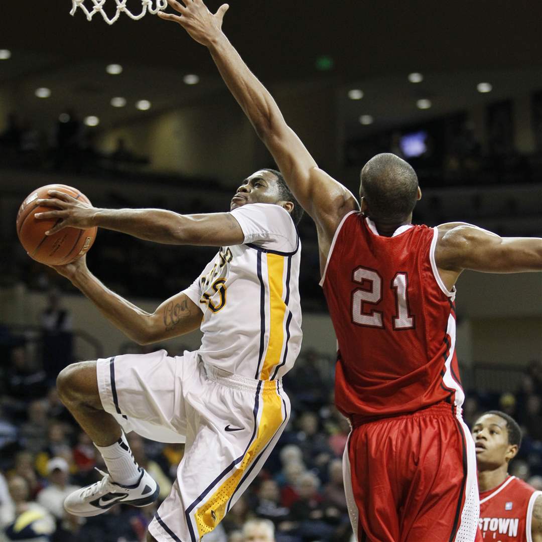 UT-player-Julius-Brown-soars-past-Youngstown-State-s-Damian-Eargle