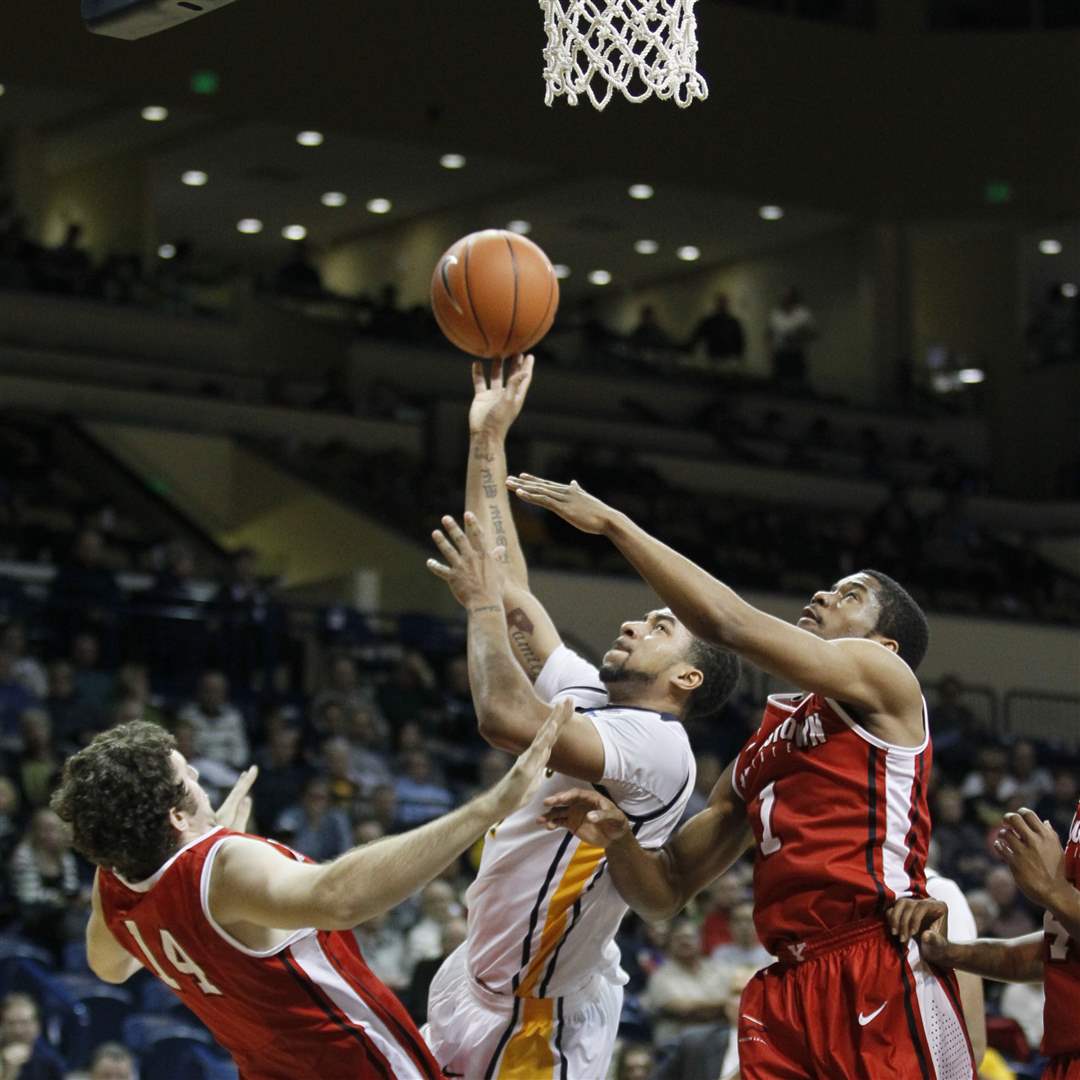 UT-s-Dominique-Buckley-fights-a-crowd-for-a-score