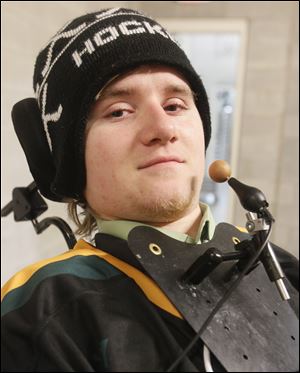 Former Clay High School hockey player Kyle Cannon, who was paralyzed while competing in 2008.