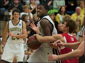 Xavier Brown, a Bowling Green High School graduate, has played as a combo guard, and more recently works mostly in a point guard role for the College of Wooster.