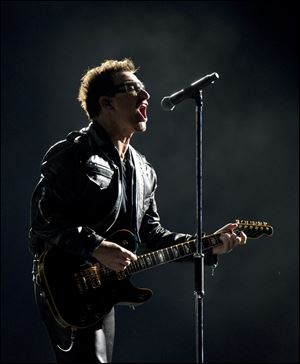 U2 frontman Bono performs on July 8, 2011 in Montreal as part of the band’s ‘360’ tour.