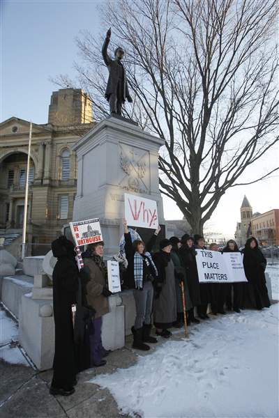 Protestors-in-front-of-the-statue-of-Harvey-Gibson