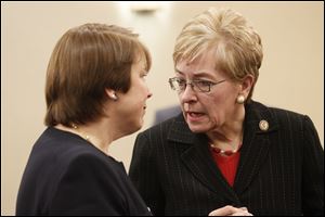 U.S. Rep. Marcy Kaptur speaks with NRC official Cynthia Pederson.