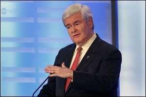 Newt Gingrich and other Republican presidential candidates focused their criticism on Mitt Romney during the second weekend debate in New Hampshire.