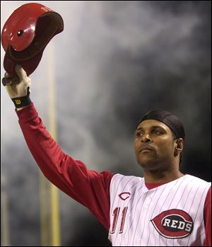 In this 2004 photo, Cincinnati Reds' Barry Larkin takes a curtain call after hitting a pinch-hit grand slam off St. Louis Cardinals pitcher Steve Kline. Larkin has been elected to baseball's Hall of Fame. The shortstop received 86 percent of the vote in balloting by the Baseball Writers' Association of America. 