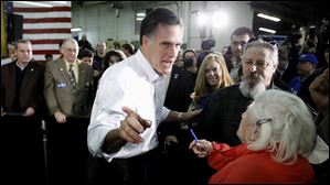 Former Massachusetts Gov. Mitt Romney makes a campaign stop at Gilchrist Metal Fabricating in Hudson, N.H. The Granite State's primary is Tuesday and Mr. Romney leads the field of GOP contenders.