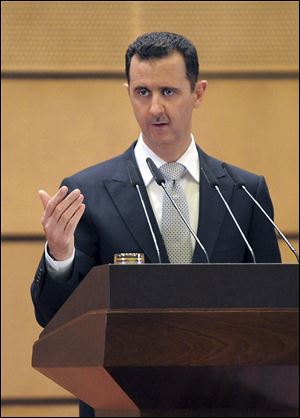 Syrian President Bashar Assad delivers a speech at Damascus University, Syria.