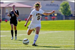 'I was definitely shocked,' says Sam Barker of Temperance after Sports Illustrated pointed out that her 13 game-winning goals for Adrian College this fall were the most among college soccer players, men or women. She was named an NCAA Third Team All-American.