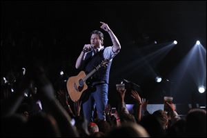 County star Blake Shelton enchants the nearly sold-out crowd at Huntington Center. He performed 21 songs over 95 minutes.