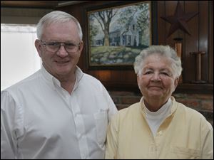 Lee and Barb Irons have lived near the  tracks nearly 45 years. 'You almost  have to talk between trains,' Mrs. Irons says.