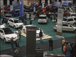 The floor is full of new cars at the 2011 Greater Toledo Auto Show.