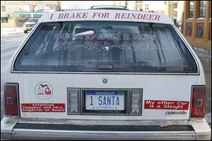 Russell Spice’s mid 1990s Oldsmobile station wagon was stolen while he worked as a security guard. But its Santa license plate and bumper stickers aided in its recovery.