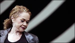 Etta James performs during the 2006 New Orleans Jazz and Heritage Festival in New Orleans.  James, the feisty rhythm and blues singer whose raw, passionate vocals anchored many hits and made the yearning ballad 