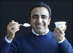 Hamdi Ulukaya, CEO of Chobani Greek Yogurt, poses at the Chobani plant in South Edmeston, N.Y. Greek yogurt now accounts for a quarter of the total yogurt market after a dizzying growth spurt that is especially apparent here in the heart of upstate New York. 