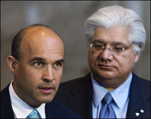 Research In Motion co-CEOs Jim Balsillie, left, and Mike Lazaridis are stepping down, and will be replaced by Thorsten Heins, a chief operating officer who joined RIM four years ago from Siemens AG.