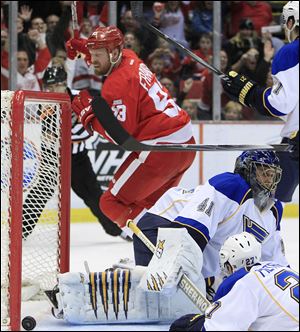 Detroit Red Wings right wing Johan Franzen (93), of Sweden, celebrates his goal against St. Louis Blues goalie Jaroslav Halak (41), of the Czech Republic.