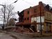 Crews on Thursday begin to demolish the Playdium building in East Toledo.