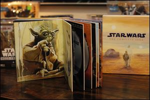 A painting by Brian Rood of Yoda is featured in the box set of 