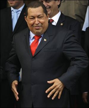 Venezuela's President Hugo Chavez threatened to nationalize any banks which did not support government farm projects.