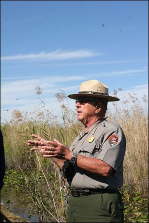 Ranger Kirk Singer explains the threats to the Everglades created by a number of exotic species -- pets that have been released into the park and taken up residence there.