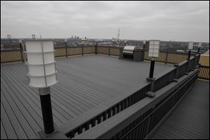 The upper deck patio has a built-in grill as well as a view of the city. Some of the residents say the mix of modern fixtures and the historic architecture is what sealed the deal for them. The building has 16 floor plans and the apartments range from 700 feet to 1,500 square feet. Rent is between $480 and $1,200 per month.