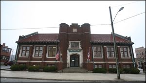 The courts took over the 1912 building in 1975 when the library moved into new quarters a block away. Space was designated at the annex to the county courthouse, but two common pleas courts took that.