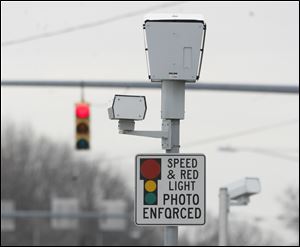 The planned installations would raise the city’s total of fixed red-light cameras to 43.