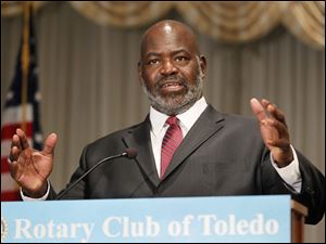 Toledo Mayor Mike Bell delivers the 2012 State of the City address during a Rotary Club of Toledo meeting at the Park Inn in Toledo.