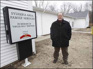 Jason Robertson, executive director of Sylvania Area Family Services, says the 5,000-square-foot expansion now under construction is being built largely by labor donated by members of local trade unions. The goal of the brick sale is $30,000.