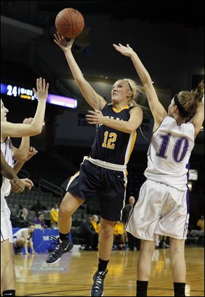 Demy Whitaker, a 5-foot-7 senior guard, is averaging 11.3 points for the Eagles. She has signed to play soccer at Bowling Green State University