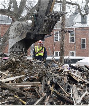 The body of Delano Fleming, 35, was found after the West Toledo apartment building in which he lived was razed. Fire officials say that one minute after a crew was sent to search the first floor, an evacuation order was given, leaving two apartments unsearched.