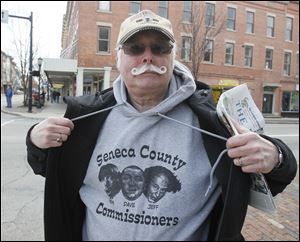 Gary Dundore expresses his feelings toward the Seneca County commissioners. After years of debate, the county board voted 2-1 to demolish the historic landmark.