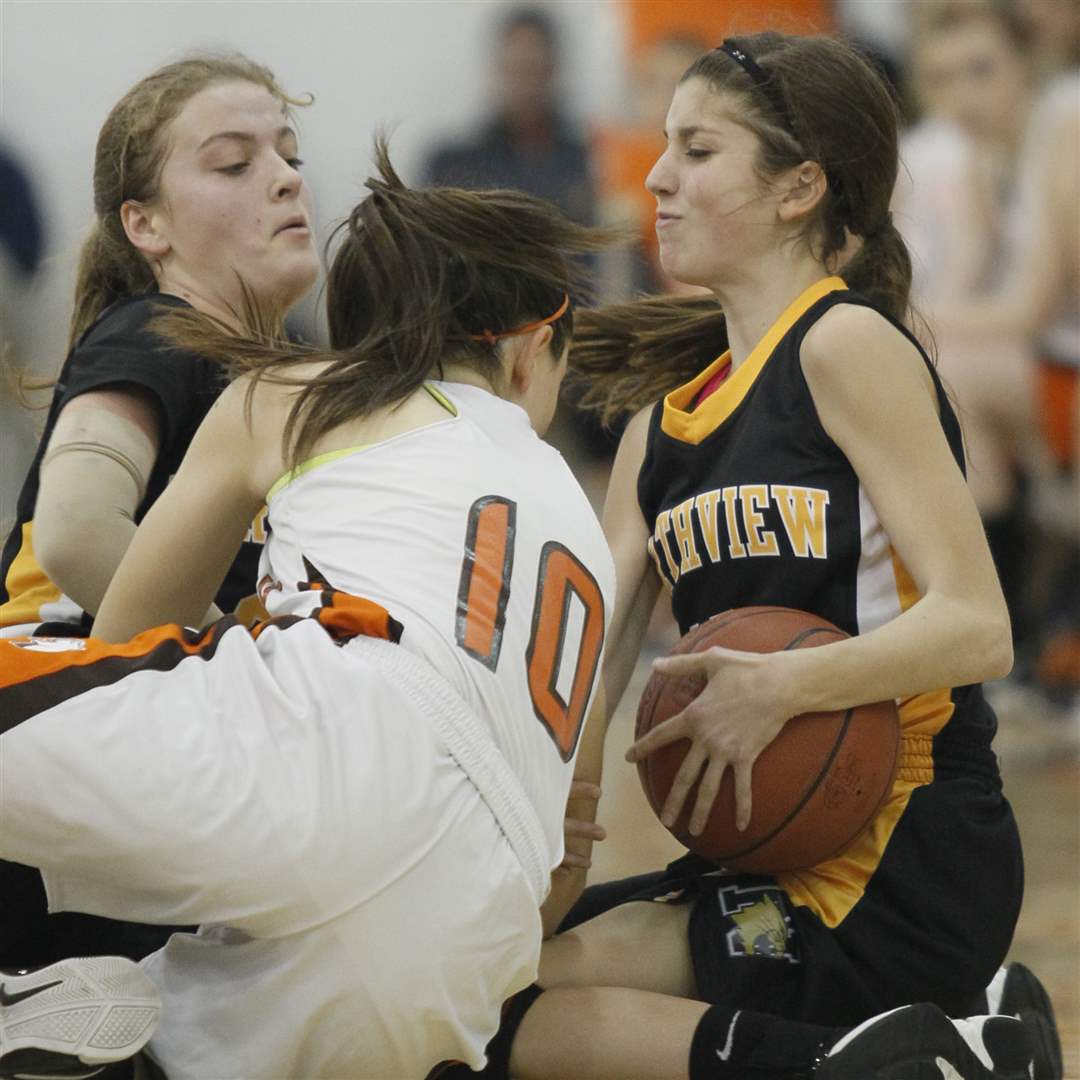 Northview-s-Miriam-Justinger-30-and-Mallory-Small-10-scramble-Southview-s-Bailey-Hejl-10-for-a-loose-ball