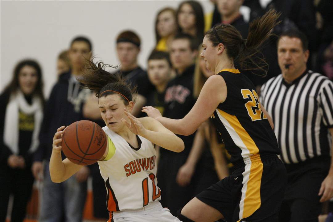 Southview-s-Bailey-Hejl-10-is-knocked-over-by-Northview-s-Sylar-Rose