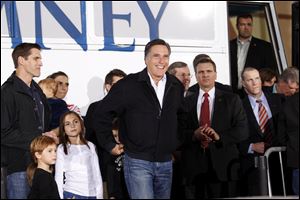 Republican presidential candidate, former Massachusetts Gov. Mitt Romney, arrives at a campaign rally in Henderson, Nev., Friday.