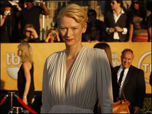 Tilda Swinton arrives at the 18th Annual Screen Actors Guild Awards show at the Shrine Auditorium in Los Angeles, California.