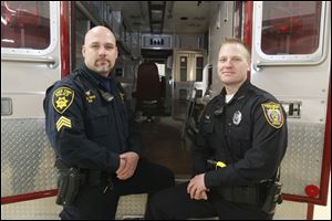 Lake Township. Sgt. Scott Sims and Perrysburg Twp. Officer Joe ball will lead a new regional SWAT team.