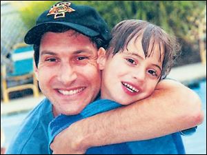 Ezra, from left, with his father, Tom Fields-Meyer, author of ‘Following Ezra.’