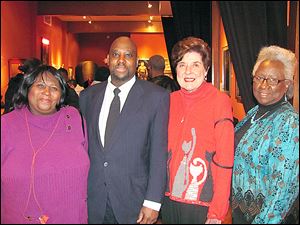 Karen Glover, daughter of the late artist LeMaxie Glover; John Wade III, exhibiting artist; Peggy Grant, and Alice Grace, exhibiting artist, at 20 North Gallery's Black History Month exhibit.