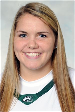 Olivia Fouty of Eastern Michigan University jostles with Alexis Rogers of Bowling Green for a shot.  Fouty ranks fourth on the team in scoring with 9.4 points a game.