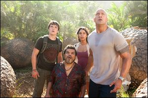 Josh Hutcherson, Luis Guzman, Vanessa Hudgens, and Dwayne Johnson star in ‘Journey 2.’