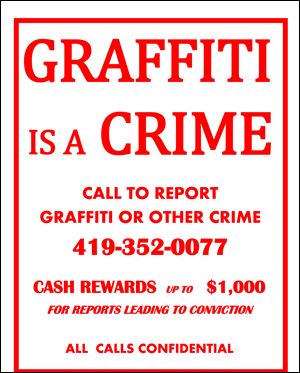 These signs are being distributed to stores by members of the Downtown Bowling Green Special Improvement District.