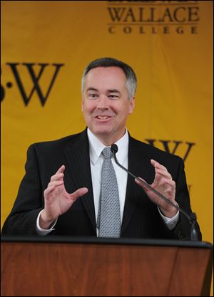 Robert C. Helmer and his family appearing at a Berea campus event announcing his appointment as ninth president of Baldwin-Wallace College.